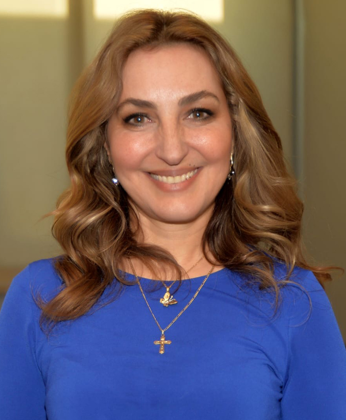 Dr. Rula Samain